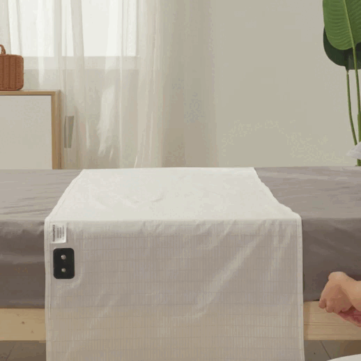 Place the Bedsheet across your bed